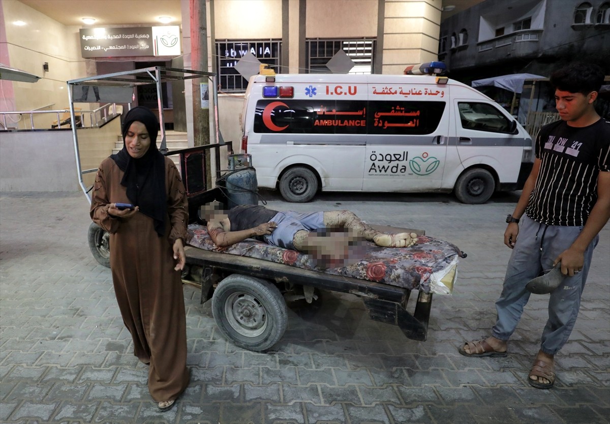 İsrail ordusunun Gazze Şeridi'nin orta kesiminde bulunan Nuseyrat Mülteci Kampı'ndaki El-Cemel...